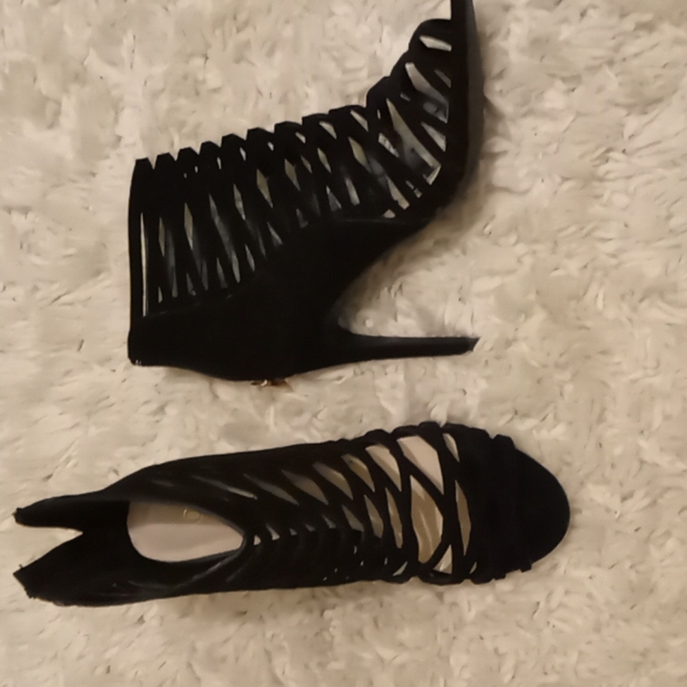 Black strappy heel booties.  New and unworn